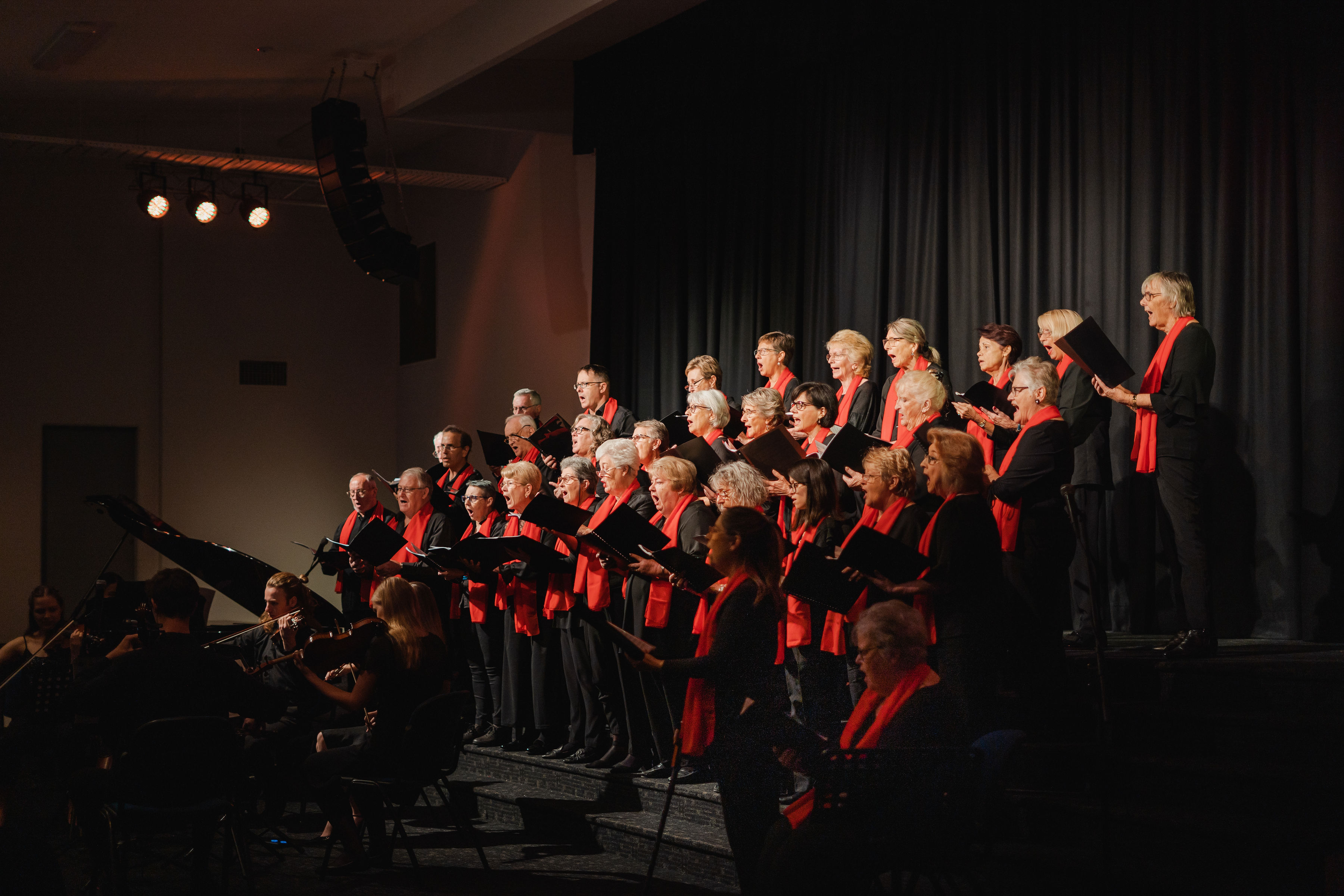 Choir singing in The Land Changes On concert